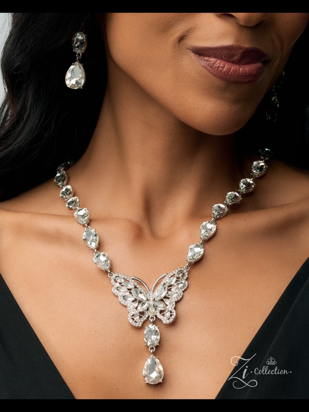 IC COLLECTION Silver Crystal Butterfly Pendant Necklace And Bracelet Set- Clear